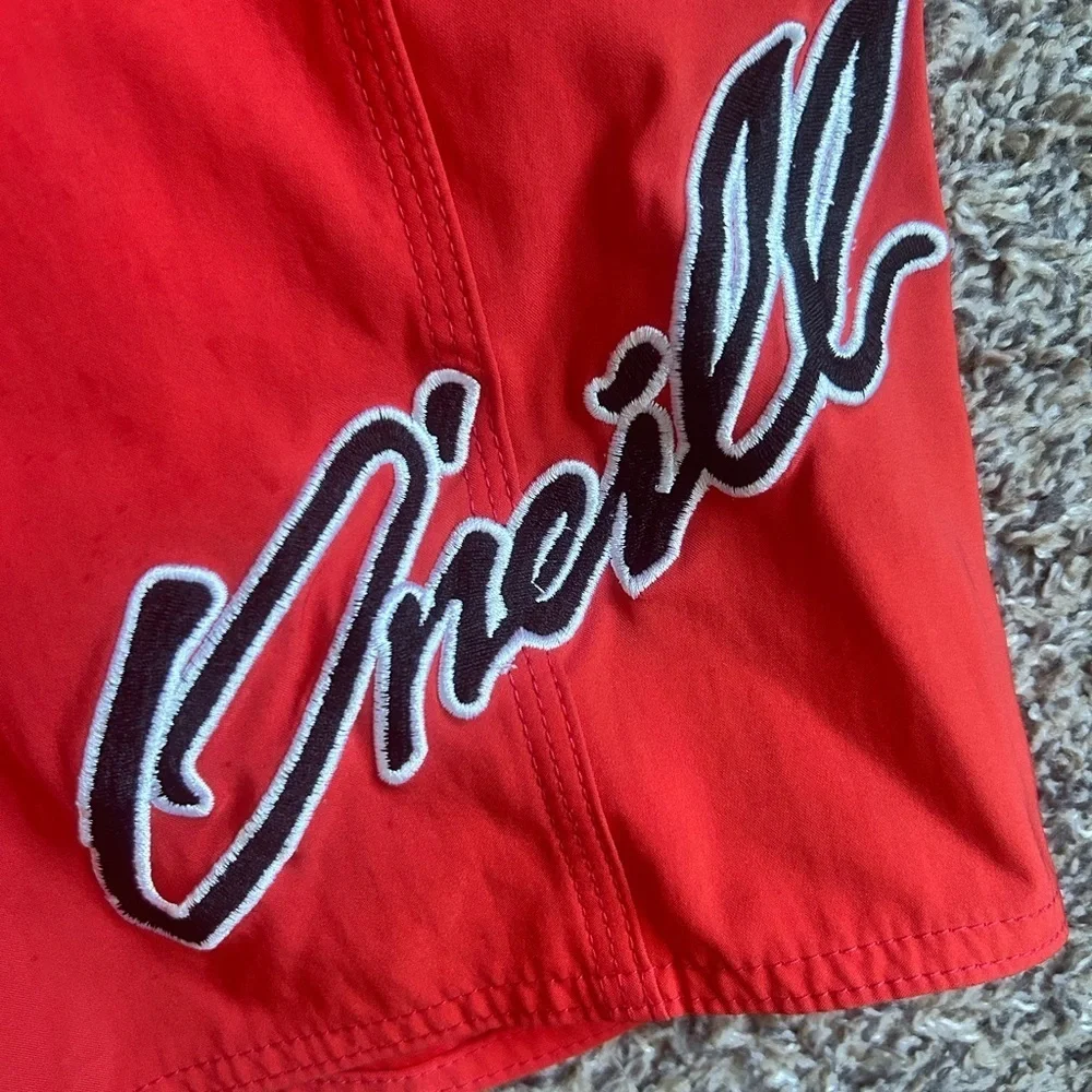 O’Neil Men’s Swim Trunks in red/orange color size 28